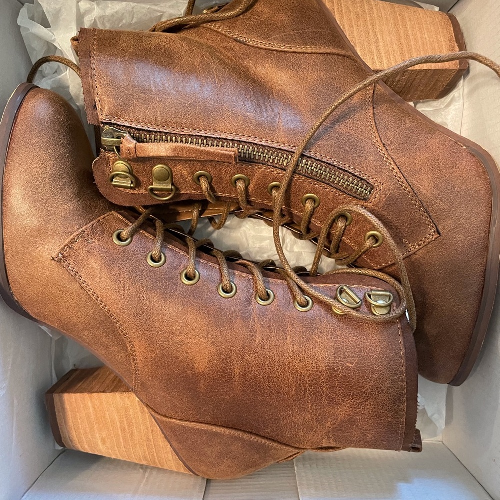 Daisy Fuentes booties. Wood chunky heel. Gently worn. Side zipper
